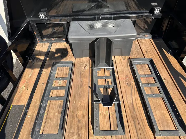 Tool box and wheel bases on the motorcycle trailer deck