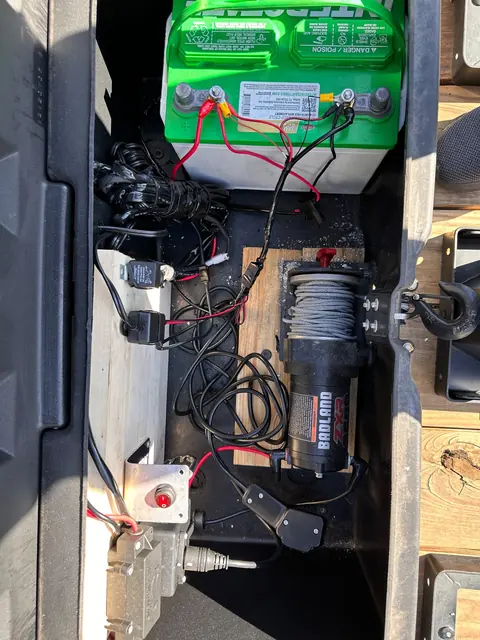 Electric winch and battery on the motorcycle trailer