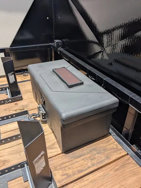 Tool box with solar panel on the motorcycle trailer