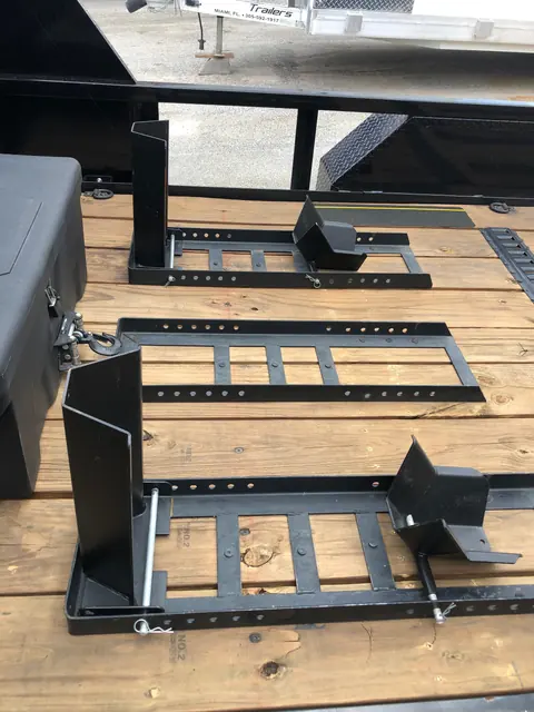Dedicated wheel-chock bases on the motorcycle trailer deck