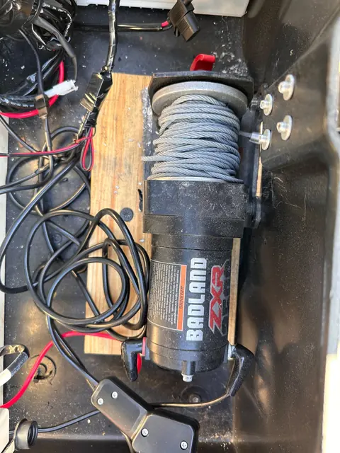 Close-up of the electric winch on the motorcycle trailer