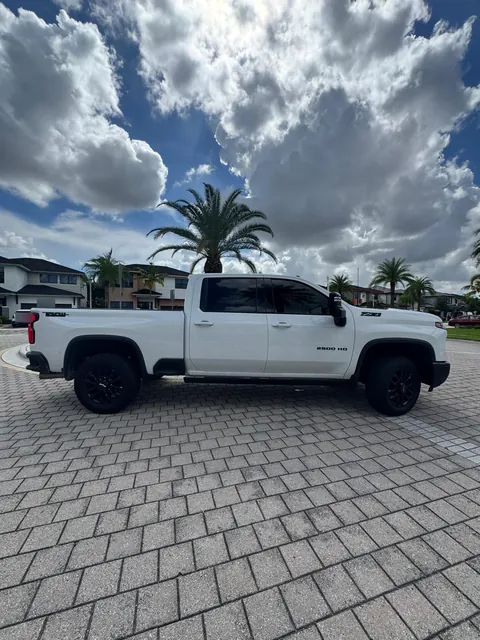 Chevrolet Silverado 2500 HD LTZ Z71 side profile on black wheels